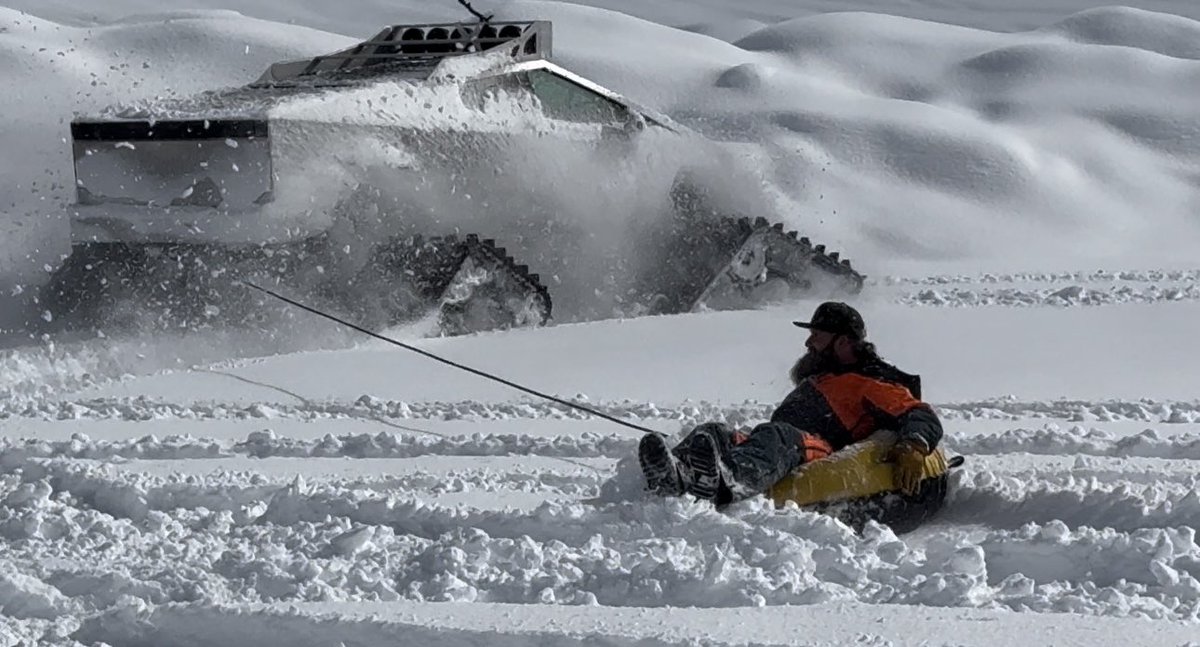RyanJTorres's tweet photo. The coolest Tesla Cybertruck I have ever seen thanks to the mods by @heavydsparks801 #snow #cybertrax @BajaDesigns #helltraxx #tesla #Cybertruck https://t.co/4MXD79j0Au