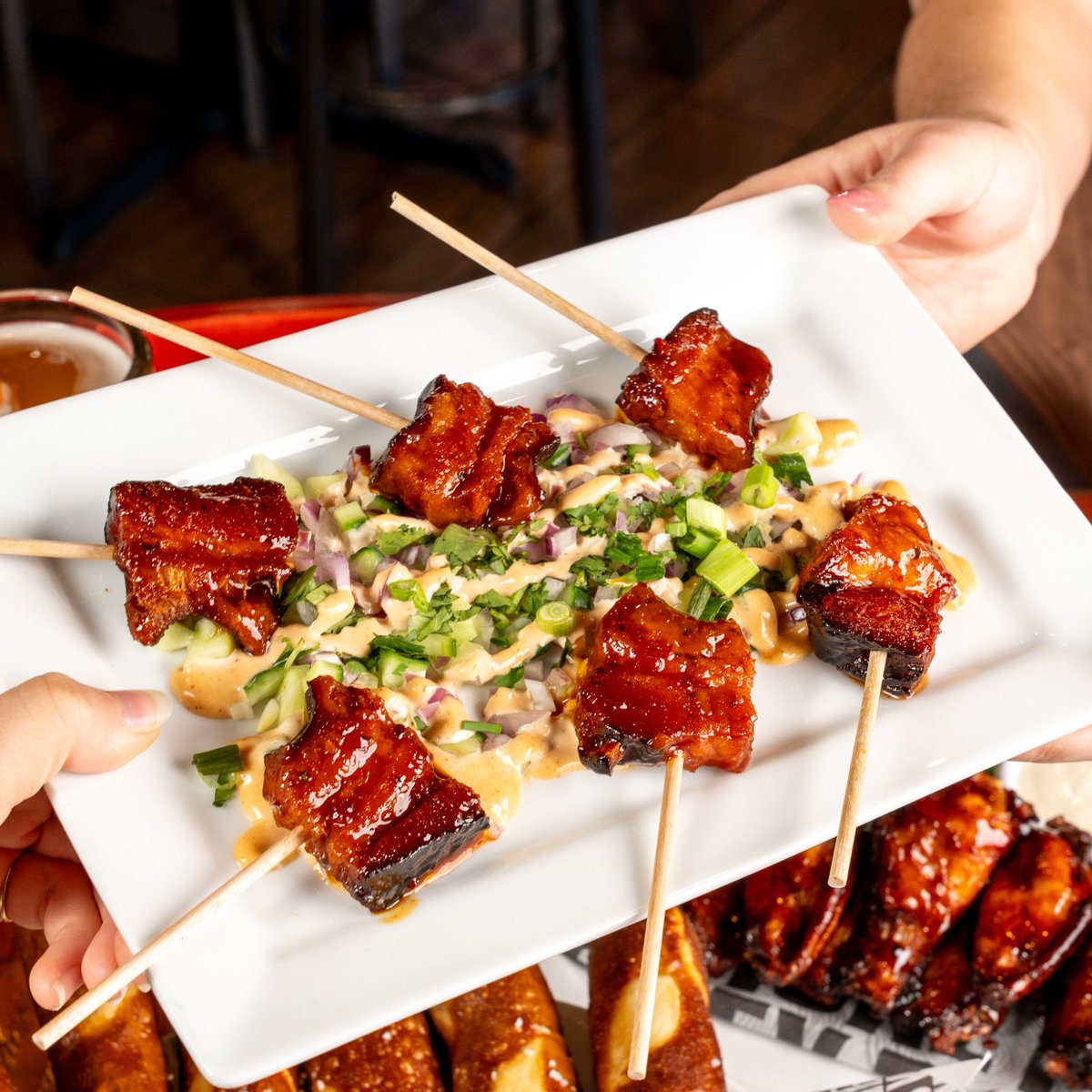 Order the Korean Pork Belly Pops for you and your friends. WARNING: there may be a fight over who gets the last one! #MastersofMeat #PorkBelly #BBQ #Meats #Foodie