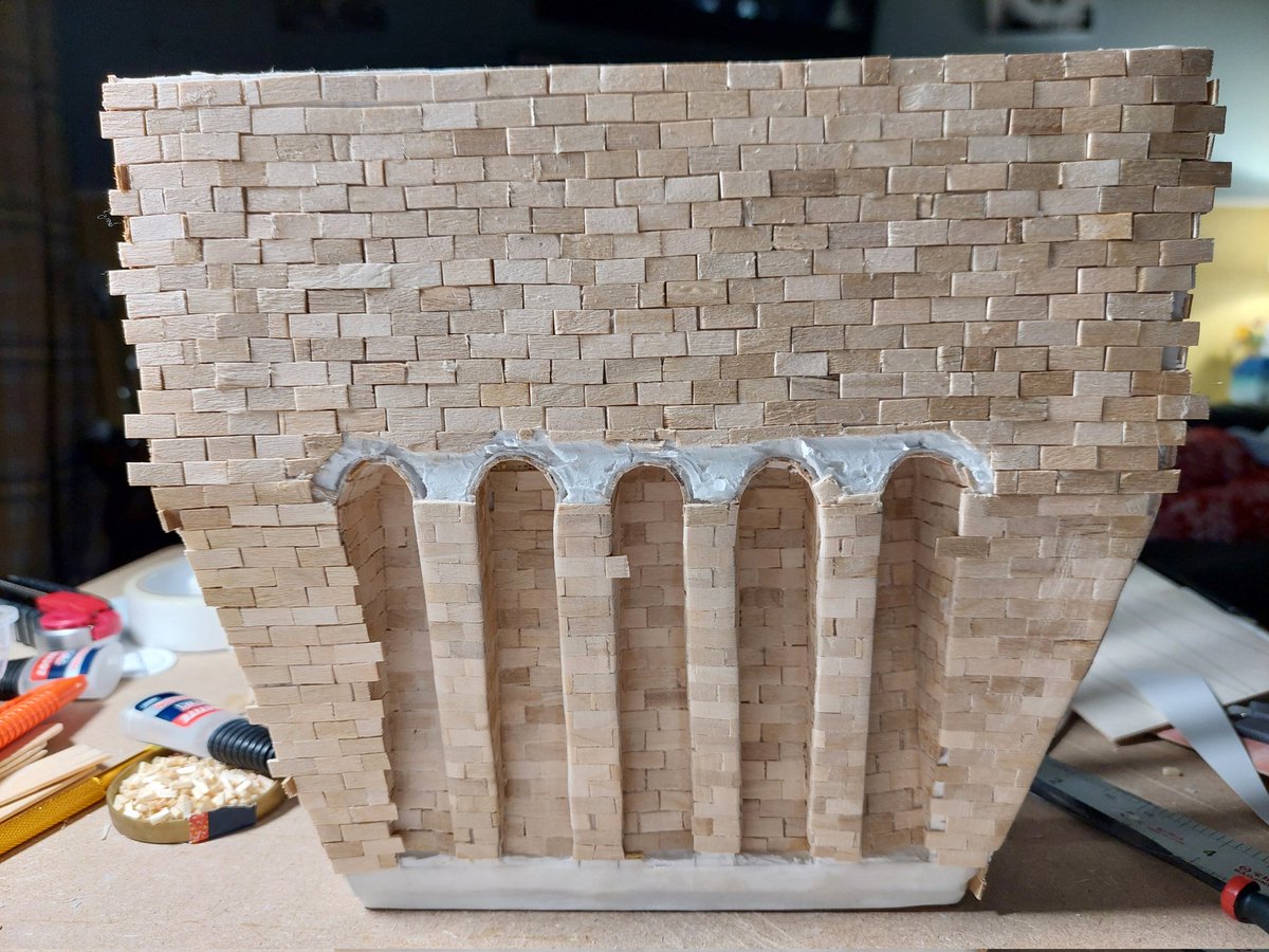 The first part of the ornamental area of the tower, the bricks yet to be trimmed, this held the 40,000 litres of water to power the opening and closing of the lock gates, Other images shows the arches which 20 of them for this part, arch bricks after being cut on the board.