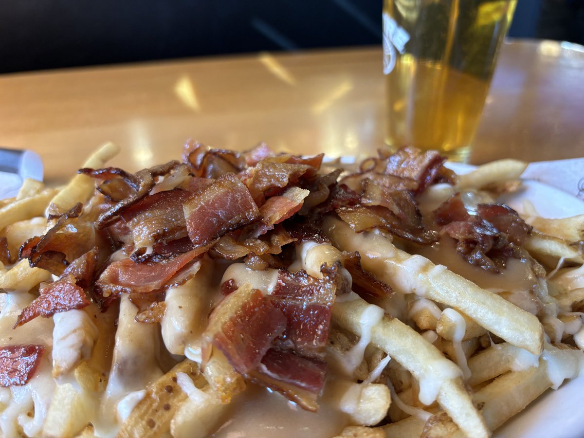 French Fries. Gravy. Cheese. Bacon. Behold the amazing #Poutine served @TomReidsPub If my heart stops for a minute or two on the house floor today you’ll know why.