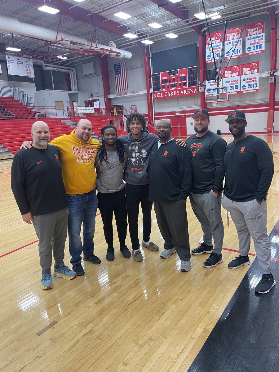 Coach_FritzD23's tweet photo. What do you do when you’re in Chicagoland for a coaches clinic? You take a detour to support one of our former football players. It was great seeing Rocky’s own ⁦@MarieonA12⁩ and the Lewis University Flyers get a big win! #Town ⁦@R_I_Schools⁩ ⁦@RIMSD_Athletics⁩ https://t.co/SOptbD2bnr