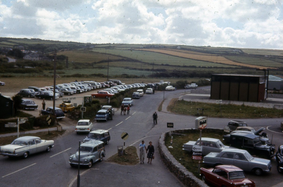 Car parking in Perranporth in 1966. This image shows the corner of Station Road many decades before the building of the local Cooperative Store. A great view of the fire station and cars outside the former Riley Garage #localhistory #rememberwhen #perranzabuloe