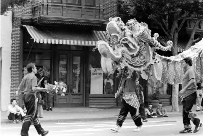 Happy Lunar New Year! 🎉 #YearOfTheDragon . . . 📸: Undated image of a Lunar New Year parade in front of the Sepulveda House on Main Street. Photo via the Chinese American Museum Collection / copyright El Pueblo de Los Angeles Historical Monument.