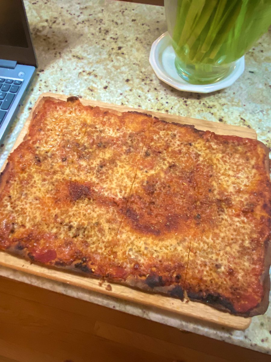 Wafer thin sheet pan pizza. Mixed Calabrian chili spread with pomi tomato sauce for some heat. Generous amount of olive oil on the pan essentially deep fries the crust from underneath. Not bad not bad