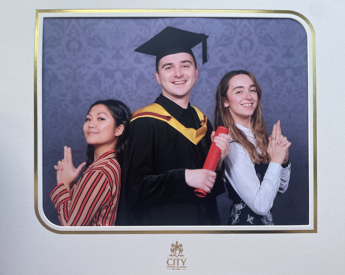 Ikierancarter's tweet image. One more and maybe (final?) graduation post from me. Might have left my life of making croissants behind, but still finding time to stuff my face with one before walking across the stage. Distinction in broadcast journalism MA - completed it.