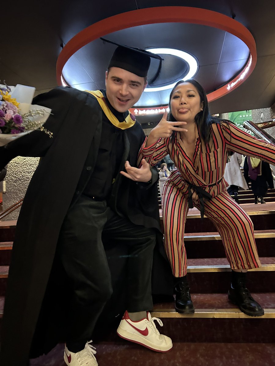 Ikierancarter's tweet image. One more and maybe (final?) graduation post from me. Might have left my life of making croissants behind, but still finding time to stuff my face with one before walking across the stage. Distinction in broadcast journalism MA - completed it.
