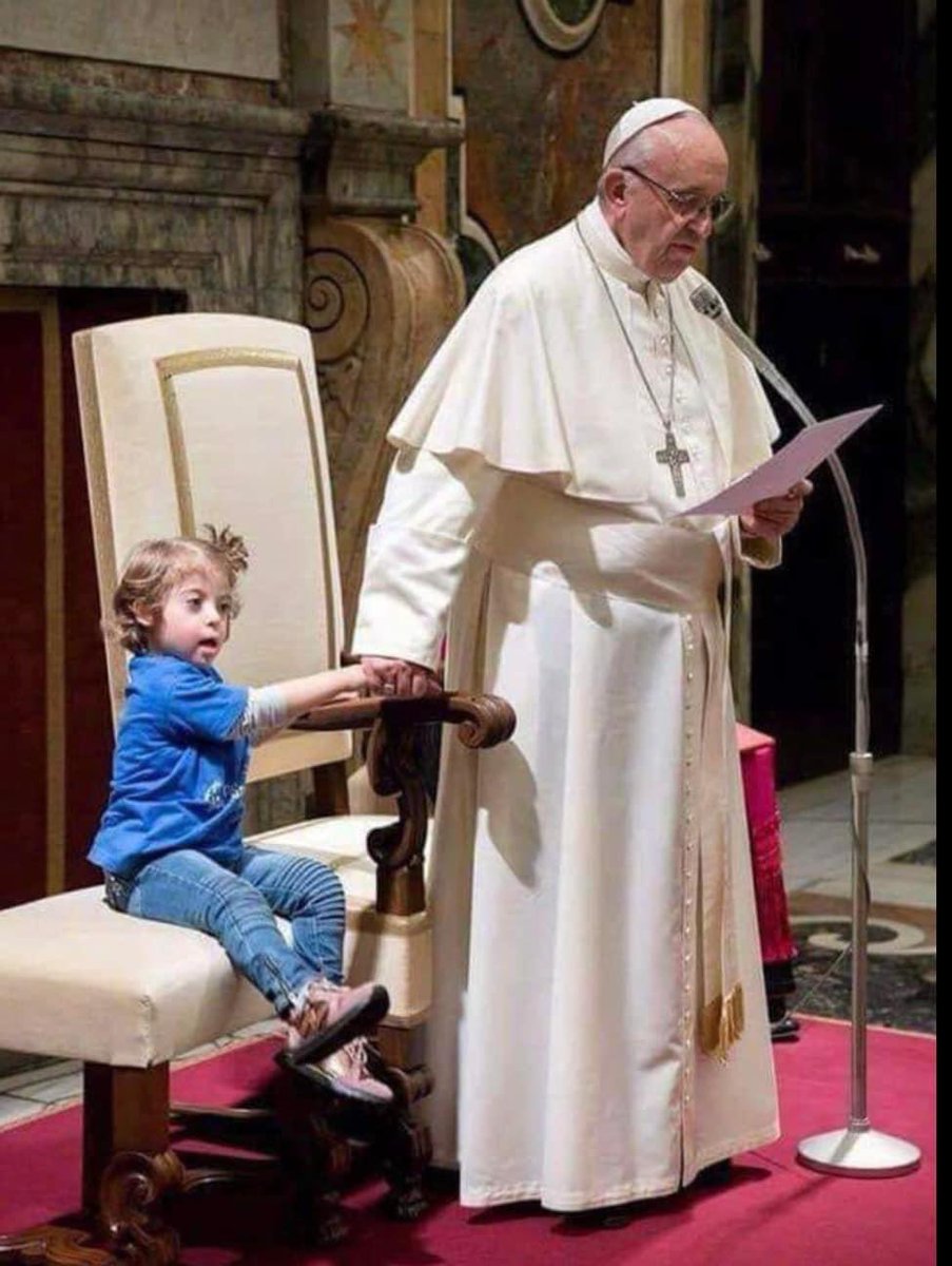 A beautiful gesture of acceptance and love...💞 A girl with Down syndrome, got up during a papal talk, and went toward the Pope. The security men quickly moved in to take her back to her mother. The Pope stopped everyone and said to the girl, 'come sit next to me.” The girl