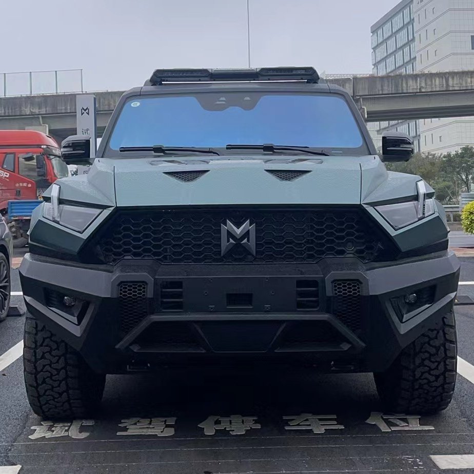 TychodeFeijter's tweet photo. Dongfeng M-Hero 917 SUV,  at the dealer in China

M-Hero is a high-end off-road SUV brand under the Dongfeng Motor Corporation (DFM). The brand only sells one car at the moment; the M-Hero 917.

That, however, didn't stop Dongfeng rolling out a specialized dealer network for M-Hero. We have new photos of a dark-green 917 in front of such a dealer. 

The M-Hero is based on the M-Tech platform. Size: 4987/2080/1935, 2950. M-Hero sells two versions of the 917: full electric EV and range-extender EREV.

EV: four motors. 1088 hp and 1400 Nm. Gearbox: 2-speed. Top speed is 195 km/h and 0-100 takes 4.2 seconds. Battery: CATL 142 kWh. Range is 505 kilometers. Curb weight: 3293 kg.

EREV: 1.5 turbo and three electric motors. 816 hp and 1050 Nm. Gearbox: 2-speed. Top speed is 191 km/h and 0-100 takes 6 seconds. Fuel tank: 84 liter. Battery: CATL 65.8 kWh. Range is 1026 kilometers. EV-only range is 200 kilometers. Curb weight: 3130 kg.

The M-Hero is seriously capable off-road: AWD, AWS, tank turns, and it can wade through water. Approach angle: 31. Departure angle: 31 as well. 

Price: 697,700 yuan ($95K) for the EV and 637,700 ($86.8K) for the EREV.

@dongfeng_trucks #EVs #ChineseCars #Dongfeng #Cars @Jeep @GMC