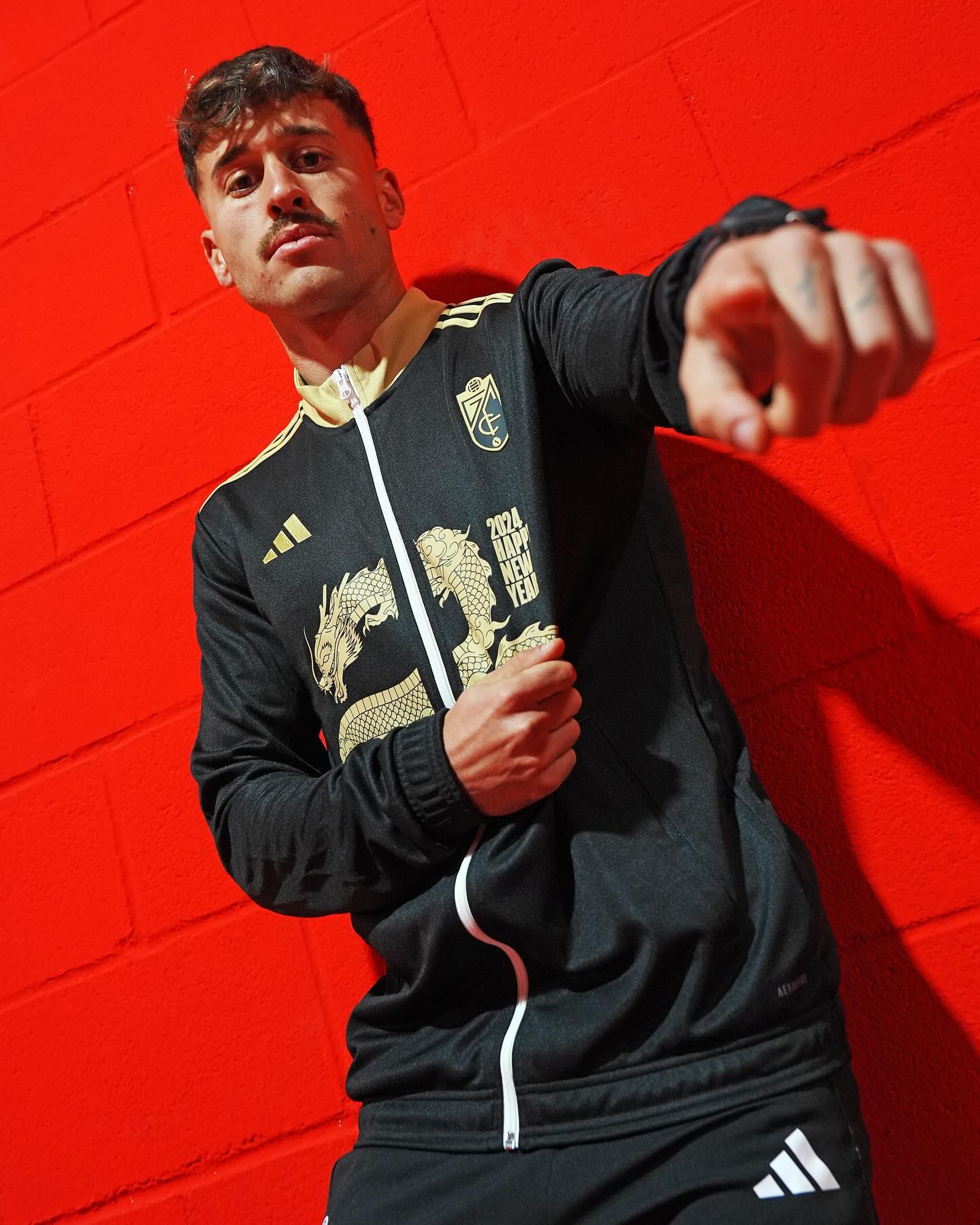 Football Shirt Culture on X Granada CF s players will turn out wearing special adidas Chinese Lunar New Year Year of the Dragon 2024 pre match anthem track jackets in tonight s La Liga fixture against