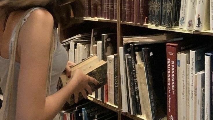 surrounded by books 📚