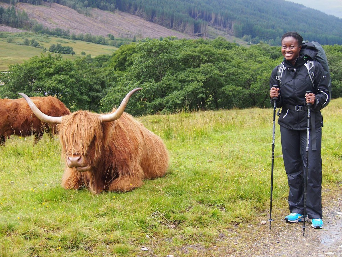 If you want to go for a hike, go. If you want to get out of the city and visit the countryside, go. Just make sure you are well prepared, (map/gps, gear for wet weather, food, water etc). Nothing is stopping you. Least of all racism! 

Seriously, no one cares! Get over yourself.