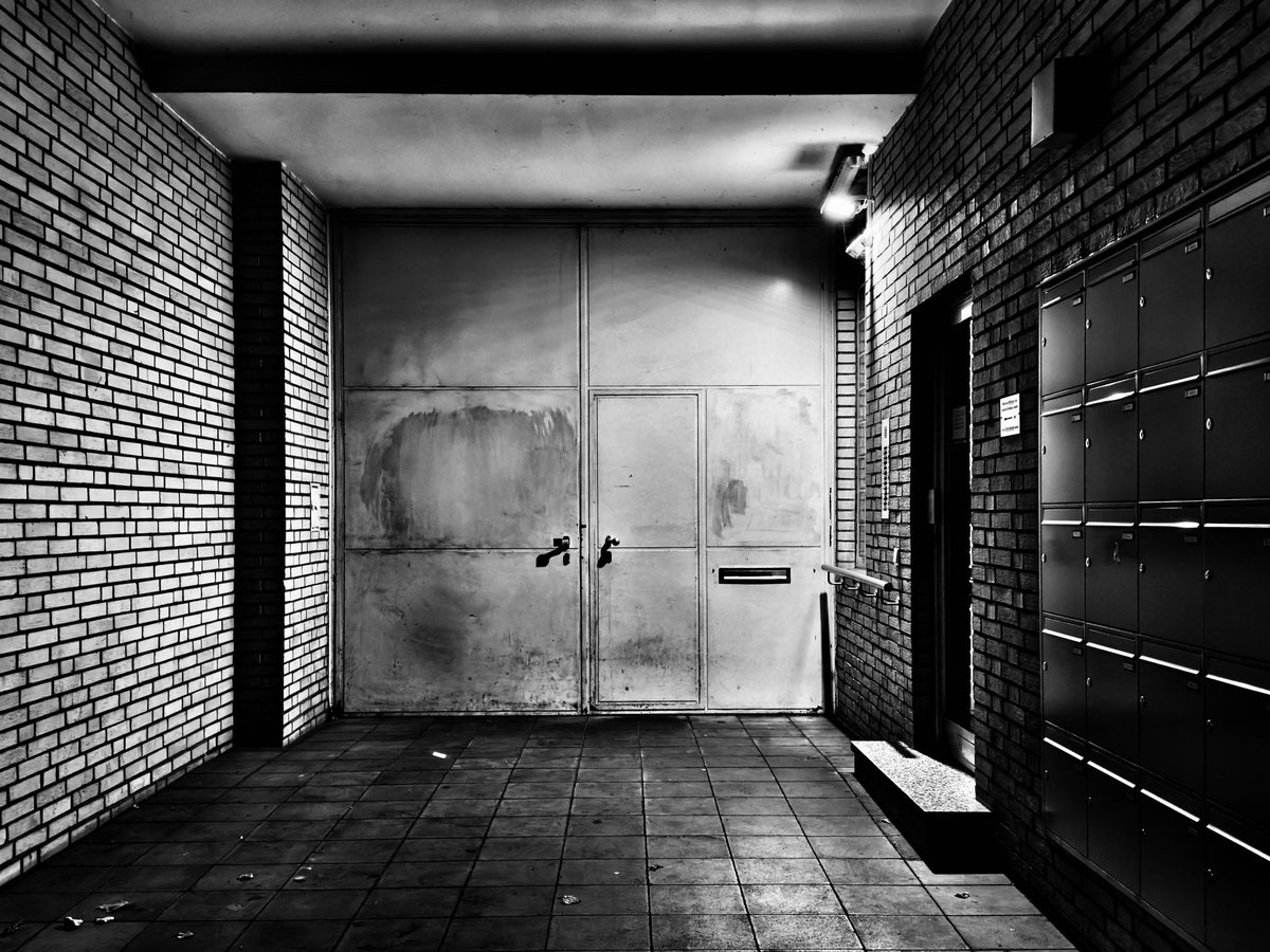 'Fear grows in darkness; if you think there's a bogeyman around, turn on the light.' ( Dorothy Thompson)

#MonochromePhotography
#UrbanExploration
#ShadowAndLight
#NoirVibes
#MysteryScene
#DoorwayToUnknown
#BrickWalls
#UrbanMystery
#DarkAesthetics
#ContrastPhotography