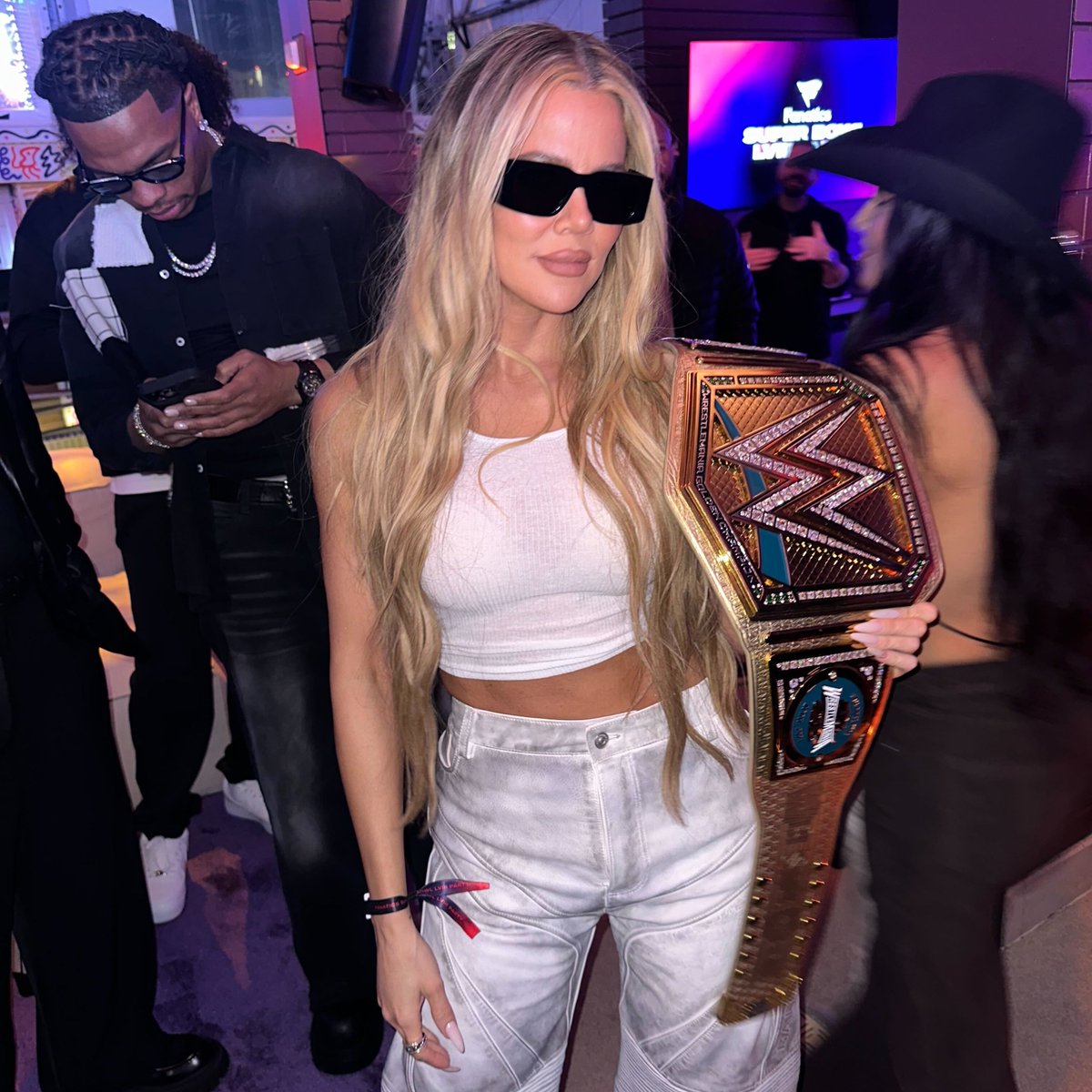 And now @SnoopDogg's #WWEGoldenTitle is in the hands of @khloekardashian?! 😲