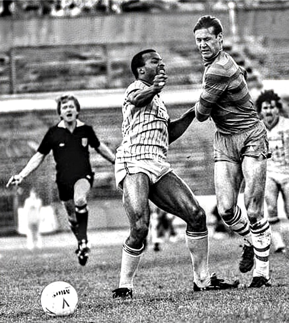 Doug Rougvie, perhaps the hardest defender to grace Pittodrie, tussles with Cyrille Regis of Coventry City in 1984, following his move to Chelsea. A referee races to intervene, certainly not a first in the Bat from Ballingry's career.