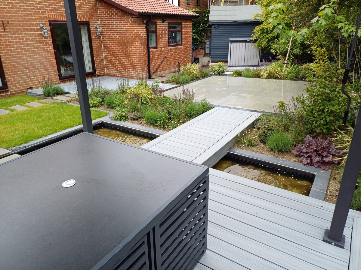 dodds_ja's tweet photo. @_LONDONSTONE patios in dove grey sandstone and midnight Black limestone alongside some @Trex_Company composite decks and walkways designed by Paul Johnson Garden Design https://t.co/DTzXifxQha