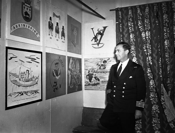 ReadyAyeReady's tweet photo. Captain E.R. Mainguy, Captain (D), Royal Canadian Navy (R.C.N.), in The Crowsnest, a club which he established for seagoing officers, St. John's, Newfoundland, September 1942. (LAC a204634-v6) #RCN #History https://t.co/b6QGhGCDgm