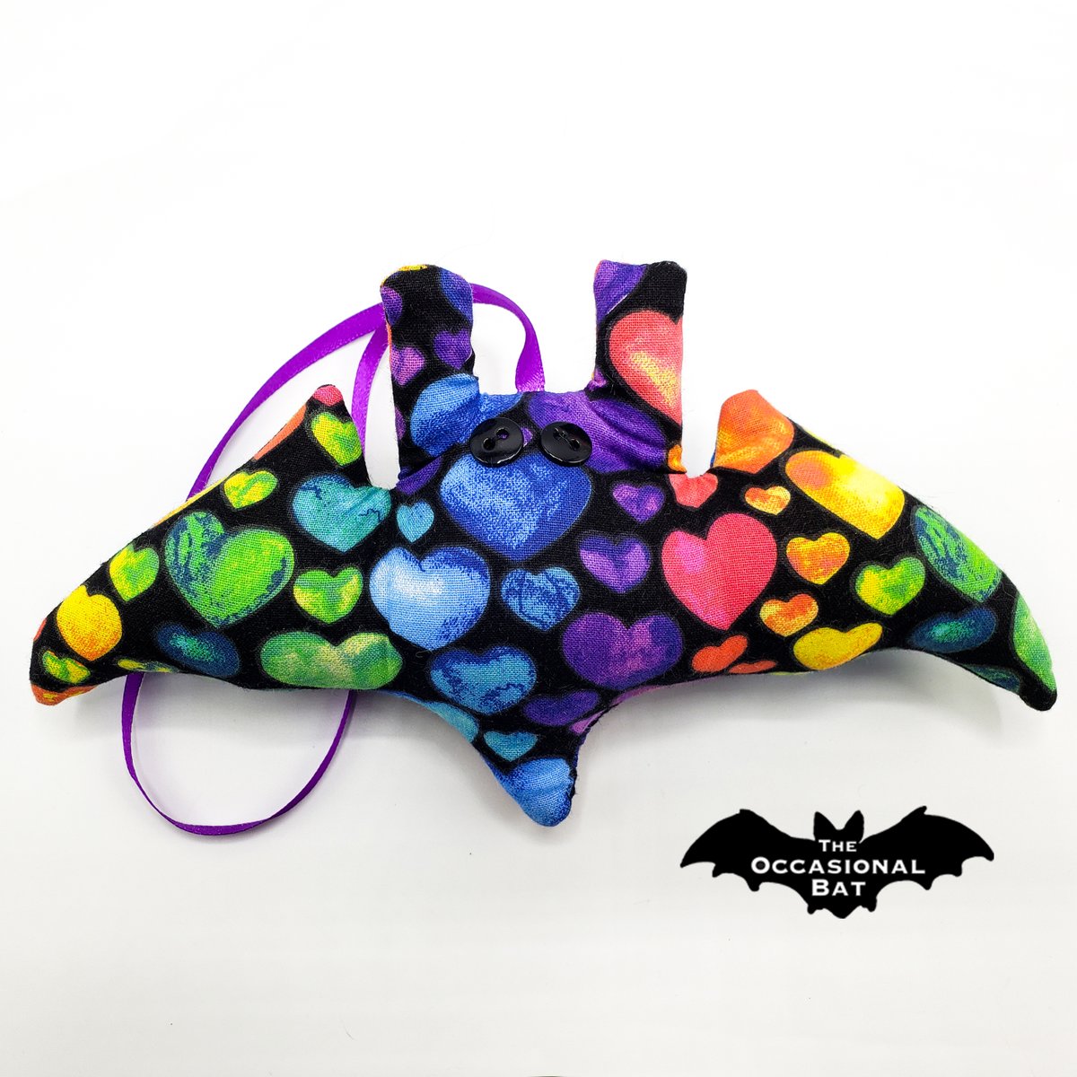 OccasionalBat's tweet photo. Let your imagination take flight as you delve into a daring journey filled with magic and wonder. 🌈🌙✨ #bat #handmade #ornament #microbat #love #hearts #rainbow #gift #theoccasionalbat #etsy 💓 https://t.co/a1vikdgFUf https://t.co/B4tdAorx4H