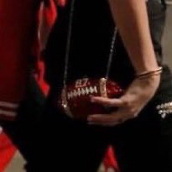 SwiftNYC's tweet photo. Taylor Swift’s #SuperBowlLVIII outfit detail with the 87 🔥 #Chiefs https://t.co/MpArHvchQs