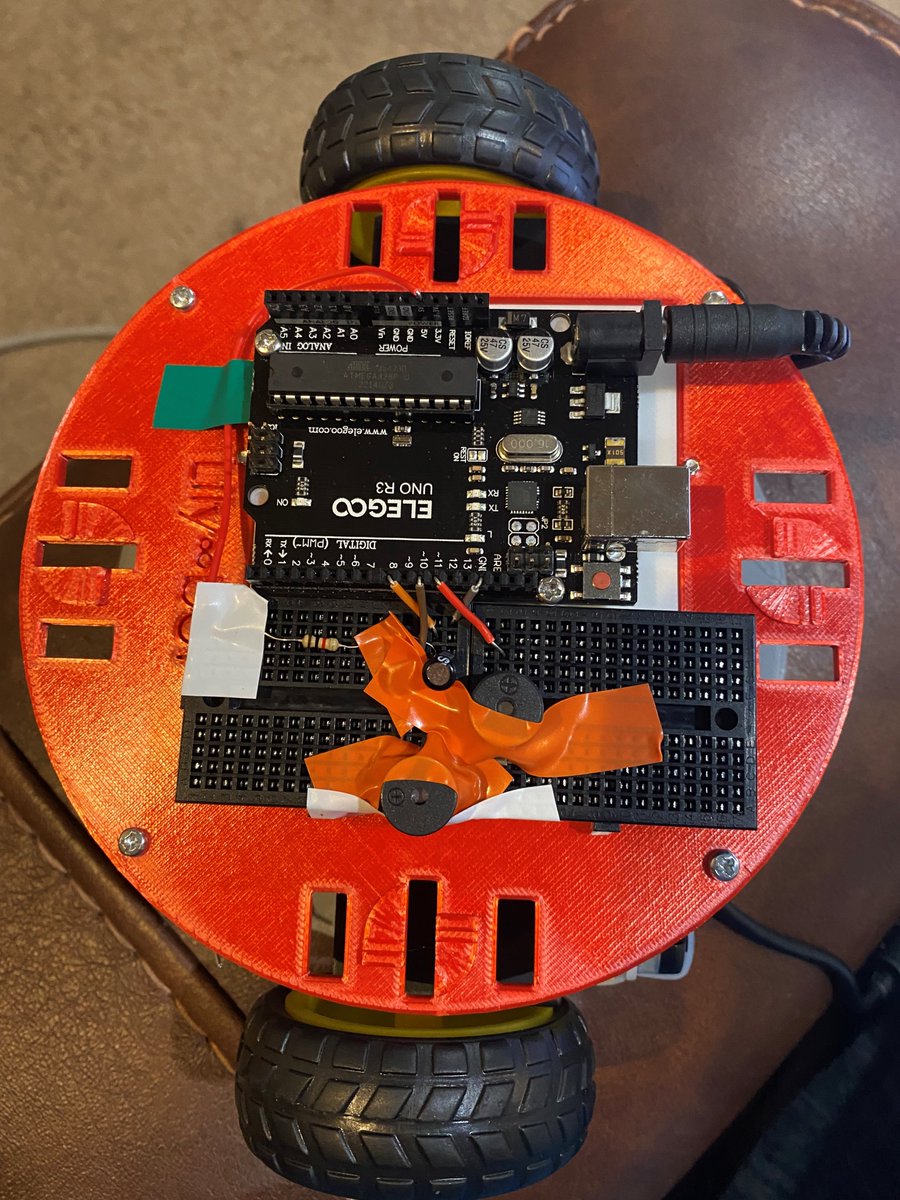 NoireSTEMinist's tweet image. I'm working on making my robots more durable and kid proof for the next demo. The kiddos were ripping out wires, driving robots toward edge of table and on and on, electrical tape on lock and wiring diagrams to help with quicker debugging. #NoireSTEMinist #RoboticsForTheStreets