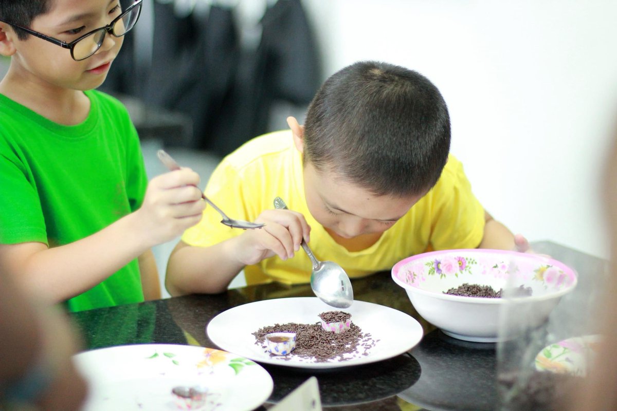 gisrayong's tweet photo. The students of GISR, Rayong, had fun learning about Brazil 🇧🇷 by making Brigadeiro treats during International Week. They enjoyed sprinkling their chocolate 🍫 desserts (made with condensed milk and cocoa powder, and tasting the sweet treats. 😋 https://t.co/FhhkdHzOgc