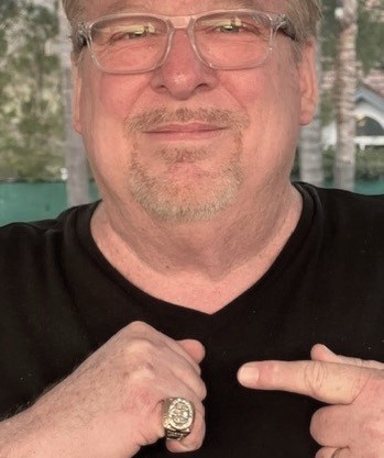 Every Superbowl I wear one of my older brother's FOUR SuperBowl rings from his years with the SF 49ers during the Joe Montana dynasty, He's now in heaven.