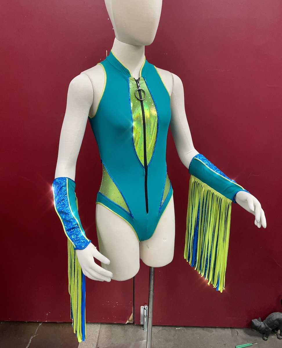 Here's a closeup shot of the Wrestling look for <a href="/plazadeaubrey/">saved</a> for the @mountaindew Super Bowl commercial. I designed and created this sparkly piece using the classic #BajaBlast color scheme with a G.L.O.W.-inspired silhouette.

Full video:
l8r.it/RalA