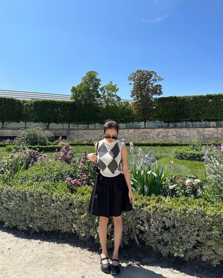 Beneath the endless blue expanse a solitary flower blooms, its vibrant petals a vivid contrast against the azure sky, a testament to nature's boundless beauty and resilience.