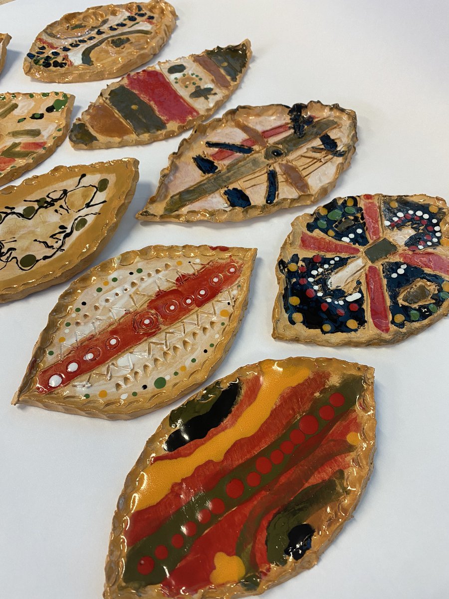 Year 2 ceramic workshop finished results. Beautiful Masai shields. <a href="/CastleNewnham/">Castle Newnham</a>