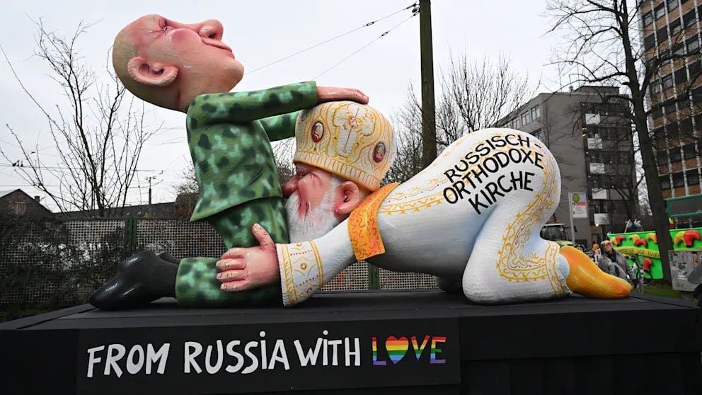 jurgen_nauditt's tweet photo. Photo of the day: Russian Patriarch Kirill and putin were ridiculed at the carnival in Dusseldorf

Papier-mâché figures show oral sex between Putin and Patriarch Kirill. The author is the German sculptor Jacques Tilly. Last year he portrayed the Russian dictator in a bath of blood.

“From Russia with love,” it says on the platform. The word “love” is painted in the colors of LGBT, a movement banned in the Russian Federation.