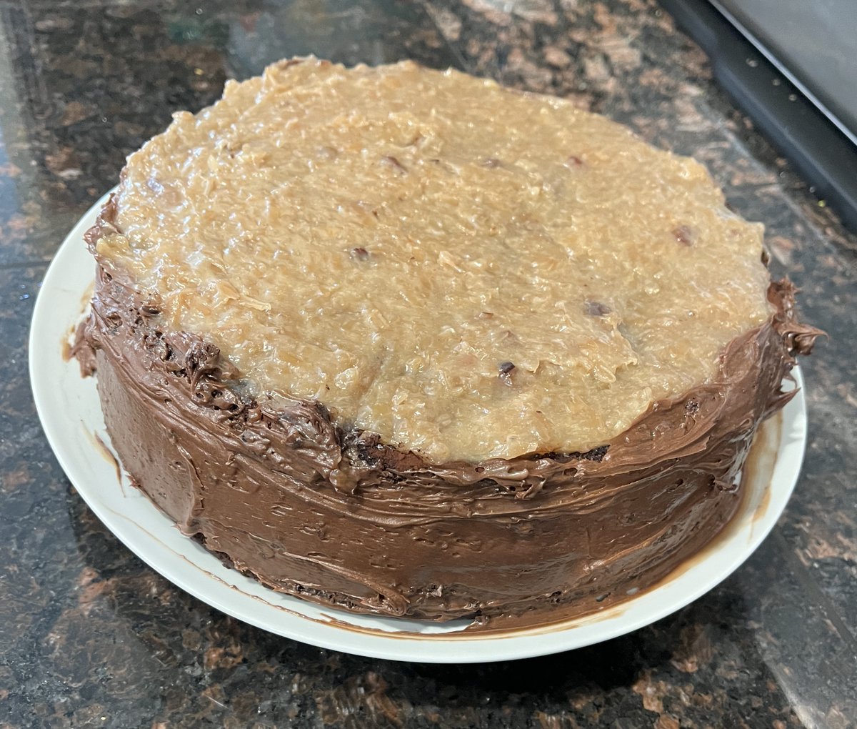 Did you know german chocolate cake is from texas?

Had my typical frosting fail, but it still tasted amazing.  I used the cake recipe from the hersheys cocoa box but substituted flour for bob's redmill gluten free flour. So soft, light and springy.