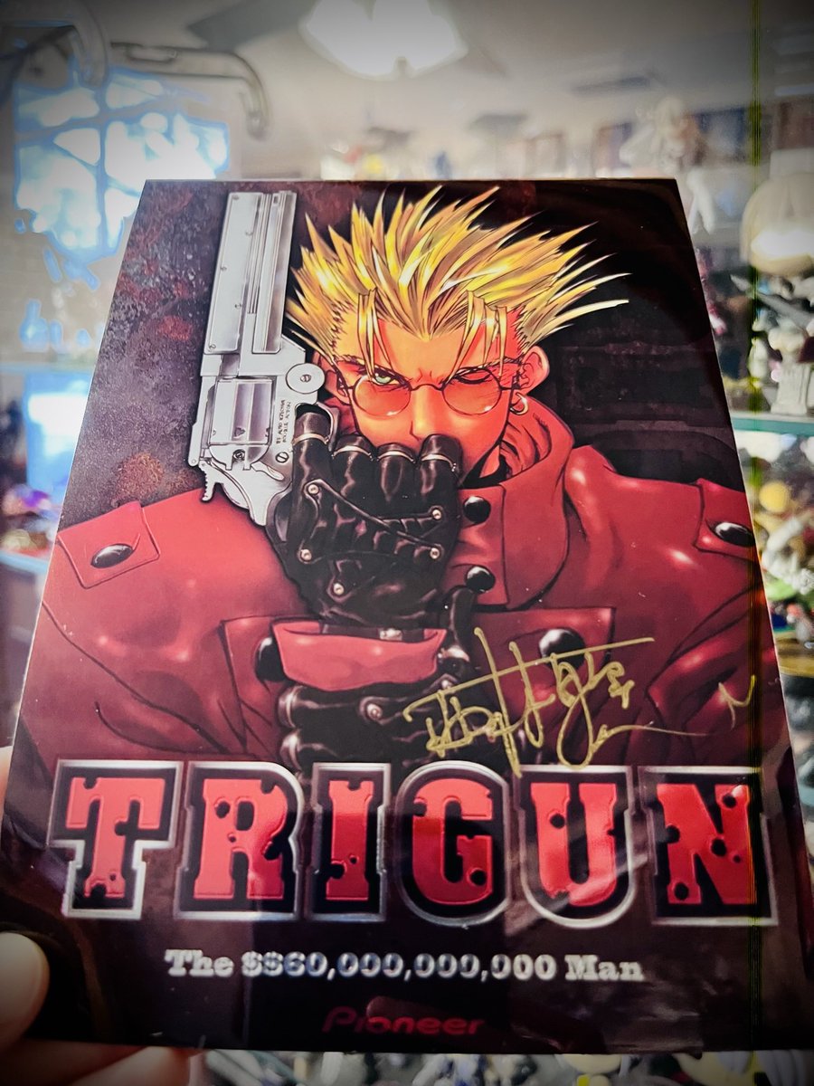 CaseyCovel's tweet photo. Got this off EBay as part of a set and had no idea it was autographed! Trying to figure out whose signature it is. @voiceoverprince and @DorothyFahn have both been suggested to me. Can anyone confirm? :) #trigun https://t.co/JCqp08zeS6