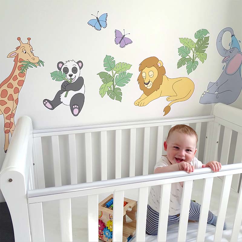 ClaireEWarren's tweet photo. My son as a baby with the jungle stickers I made for his room. I can't believe he is nearly 16 months! 🥲 https://t.co/7QFP9d9nq4