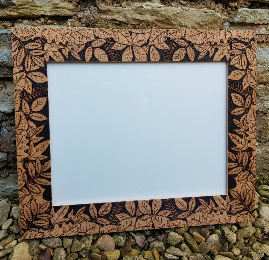 And here is the second of two frames that I delivered to a customer today... a decorative leaf border frame for a special painting to be displayed. 

#woodtattoos #pyrography #woodburning #woodburningwithstyle
#learntoburn #yearntoburn #ukcraft #ukcrafts #ukhandmade