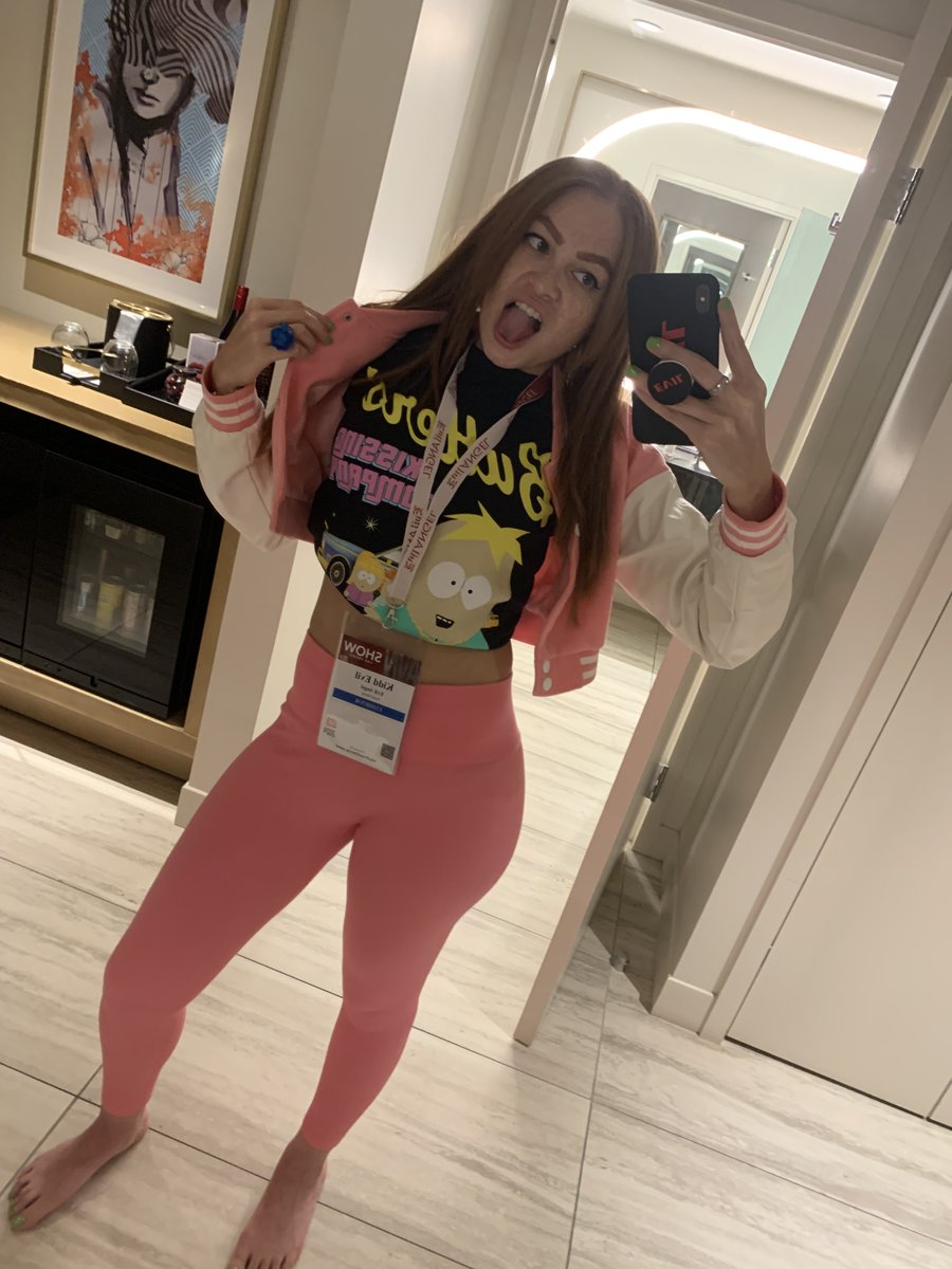 AVN @AEexpo PhotoDump! AVN Friday's outfit🩷 Rockin @evilangelvideo Varsity Jacket with the @SouthPark Butter's Kissing Co. Crop💛 & of course @FashionNova Bubblegum Pink Fighter Ribbed Leggings🩷