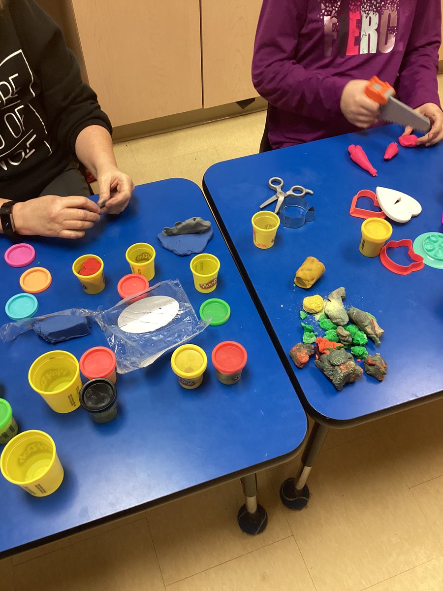 ImmaculateCES's tweet image. One of our wonderful support staff and a student making a visual model to help this student utilize a visual representation to help her remember details for her upcoming speech on dolphins #WeAreICS