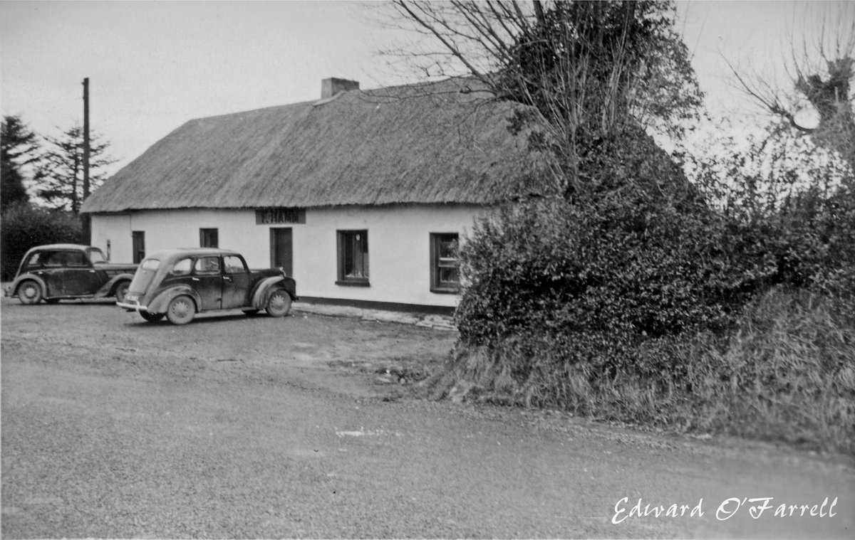 The Holy Cross pub on the old Cork Road, just outside Waterford City. At the time the pub was owned by F. Hamm judging by the sign over the door. Date would be late 1950's.
#waterford #ireland #irish #thatchedroof #oldphoto #blackandwhitephoto