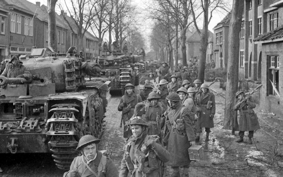 WW2Facts's tweet photo. Churchill tanks and soldiers of the 9th Durham Light Infantry in Schilberg, Netherlands, in January 1945.

#History #WWII https://t.co/VcI4Qa1XrQ