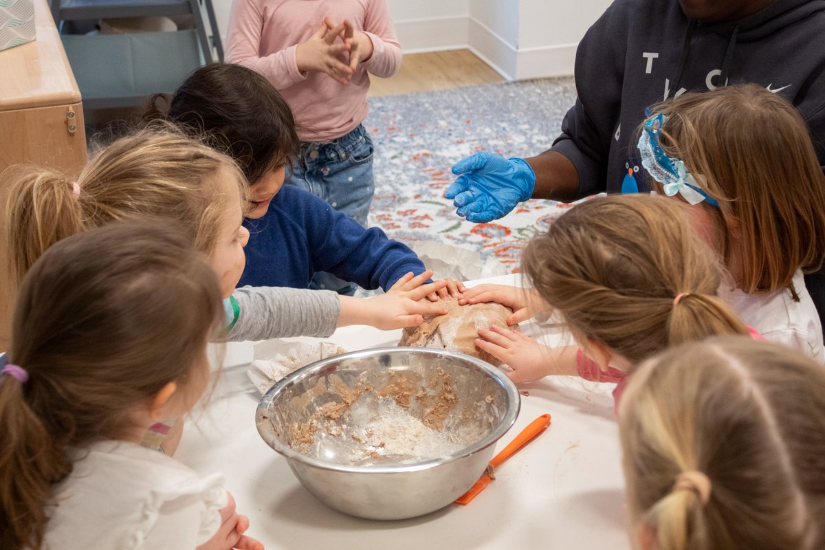 Our Pre-K worked together to make hot chocolate scented play dough.  As they followed the recipe, children measured, poured, and stirred ingredients together.  Children were excited to watch the dough come together as they were kneading it… and it made the classroom smell great!