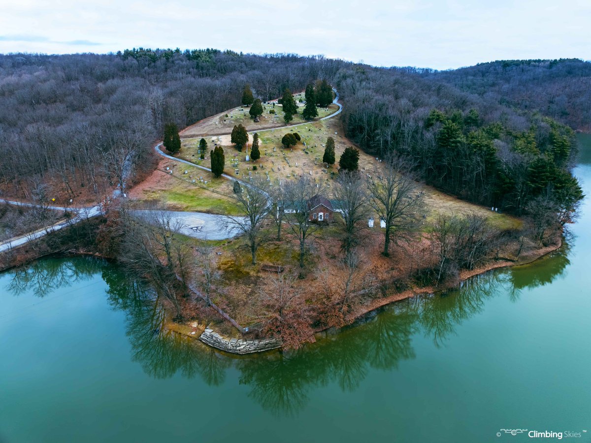 A local church & cemetery tucked away near a body of water during winter months in Beaver County, PA. 

#photography #dronephotography #djidrones #beavercountyPA #Pennsylvania #churches #cemetary #smalltowns #nature #baretrees #bodyofwater #outdoors #explore #winter
