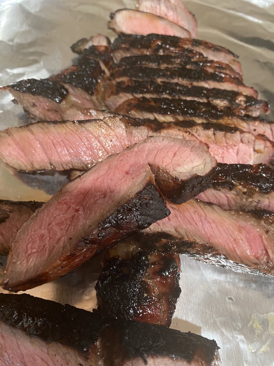 London broil. Marinated overnight in balsamic vinegar and garlic. Reverse sear. Pulled it a few degrees more than I wanted but still very tender and good.