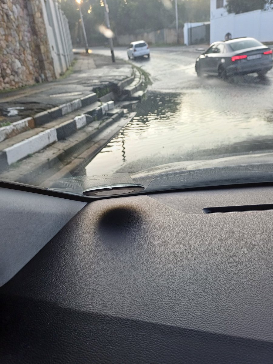 ZET009's tweet photo. @JHBWater @CityofJoburgZA please assist with this water and drain issue on the corner of Westcliff Dr and Loch Ave in Parkview. It has been like this since Friday. https://t.co/kw6bPAm7hs