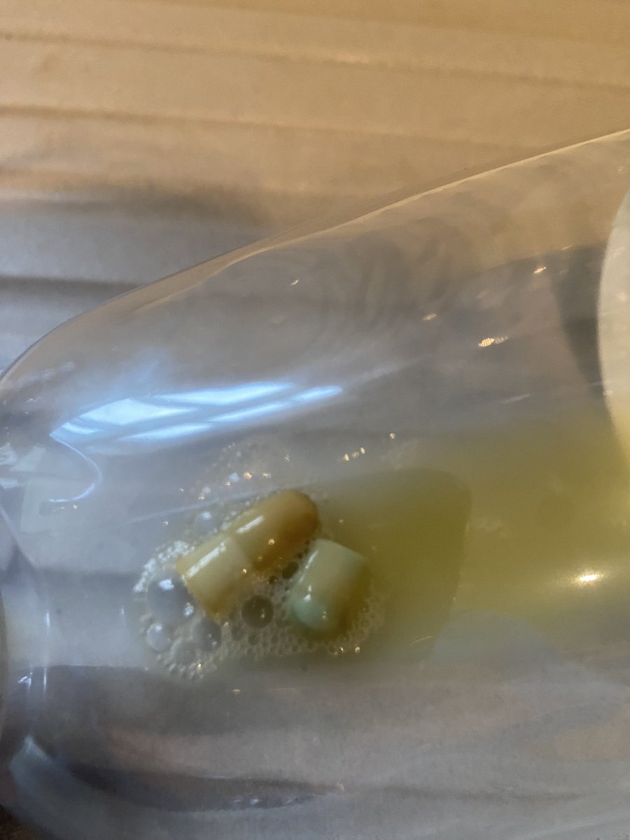 vicgorby's tweet photo. @AldiUK what on earth is this that I’ve found at the bottom of my Apple juice. Looks like a large capsule case?! https://t.co/NWQAvD28VD