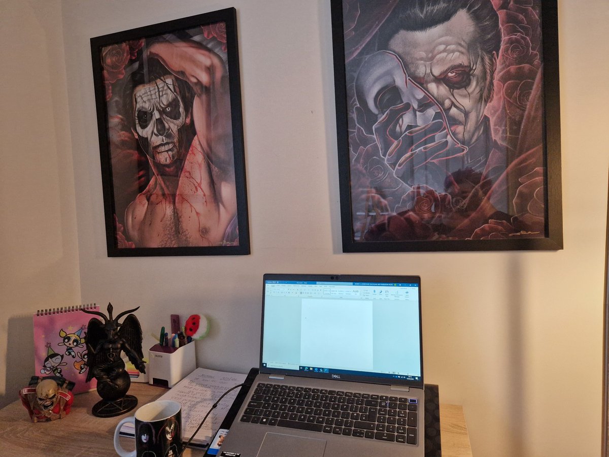 View from my desk featuring Terzo, Cardinal, Eddie the Head, Baphomet the Powerpuff Girls and Kiss. I am nothing if not totally on brand at all times 💜⚡ #workingfromhome