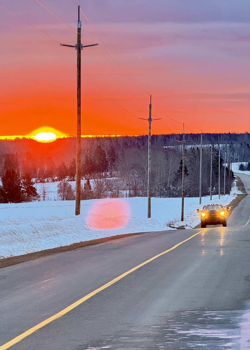 Red sky dramatic sunrise on the North Royalty Road outside of Cardigan #PEI <a href="/tsimpkin/">Tina Simpkin</a> #stormhour