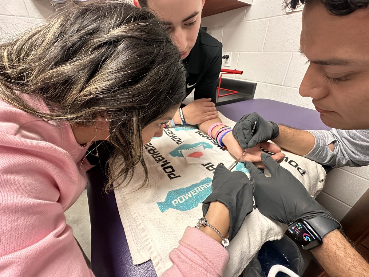 The concentration in those eyes, we don’t think she ever blinked!!! Having some fun with our students during a stitch removal ✂️