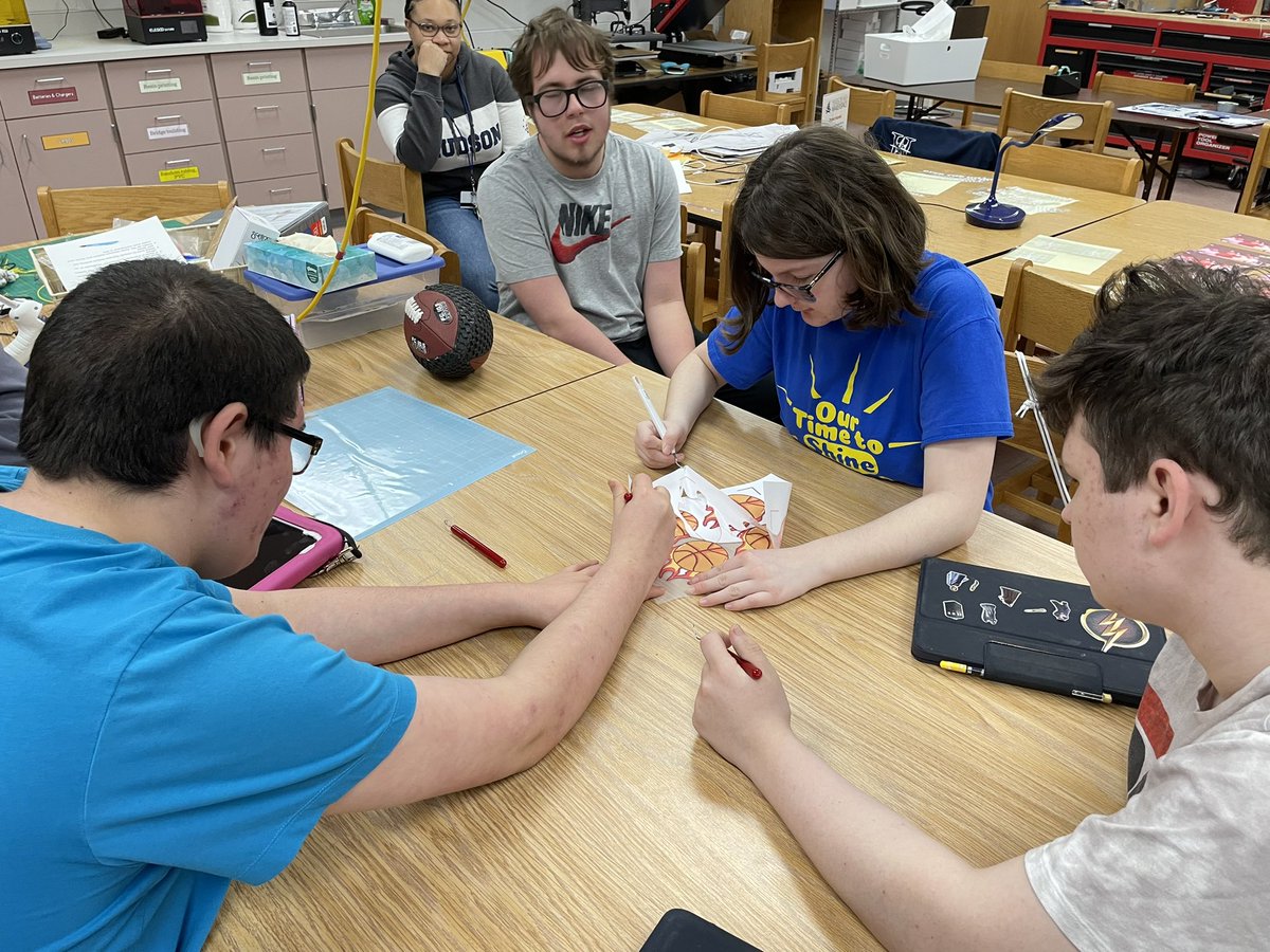 aussieandrew's tweet photo. Students in the #Makertunity program design and create t-shirts for our social studies teachers using the Cricut Maker and the heat press. #dreamitmakeit #ExplorerPride @MrBarnes_223 @LearningHudson @GARFoundation https://t.co/EeKwwfoRt2