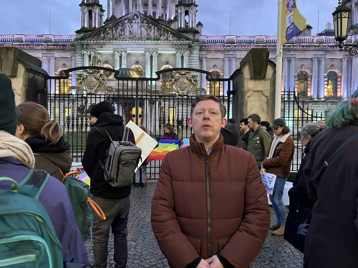 CllrPadraigSF's tweet photo. I attended a vigil outside Belfast City Hall last night in memory of Brianna Ghey, who was murdered a year ago on Sunday.
It is vital that we all stand up for Trans people throughout this Island and the world over. 🏳️⚧️🏳️🌈 #ProtectTransKids #StandByYourTrans https://t.co/CtlR3sBOq6