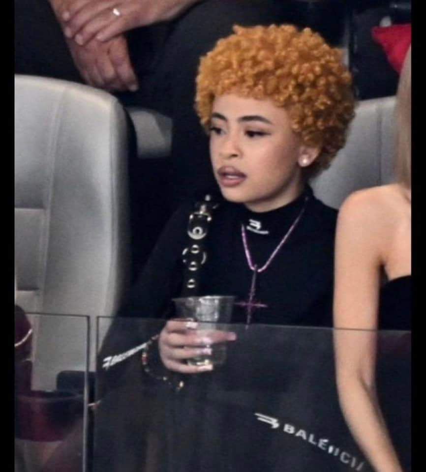 TerrencePerfect's tweet image. These people do it in your face. You will still drink the Kool aid and watch the events just like in ancient Rome. Girl throwing up Baphomet sign with an upside down cross, and with a Balenciaga attire on the side. They aren't hiding their Satanism it's in your face.