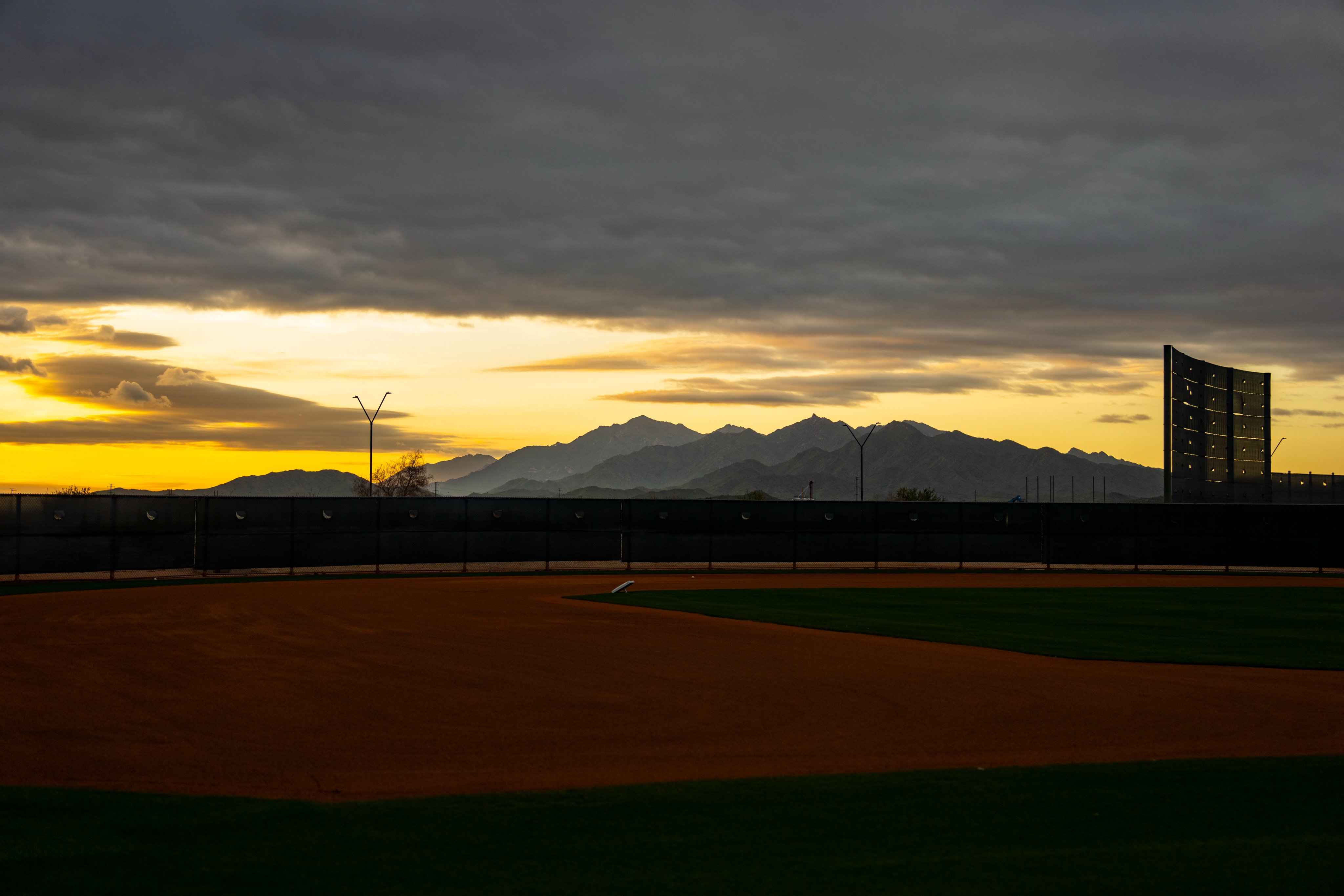 A sunrise with mountain in the background at the Cincinnati Reds Player Development Complex. 