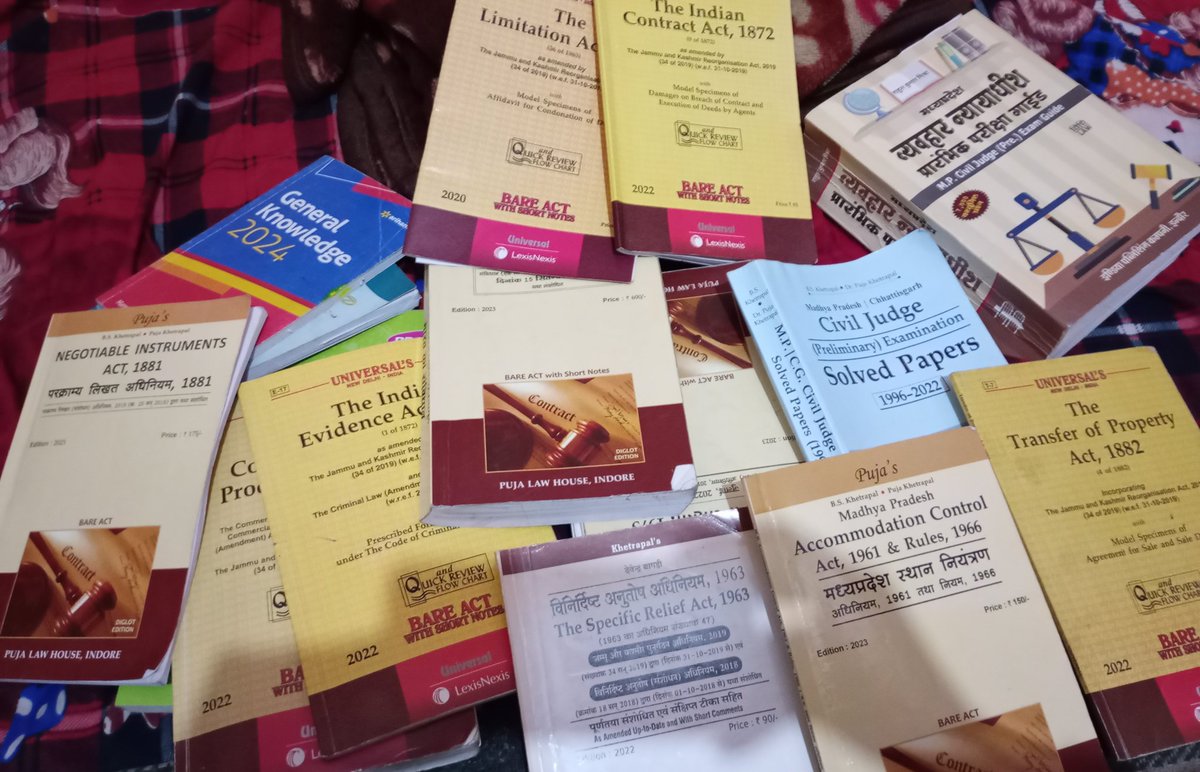 Pretty childish but what makes me happy is that I have a lot of books and bare acts....😊